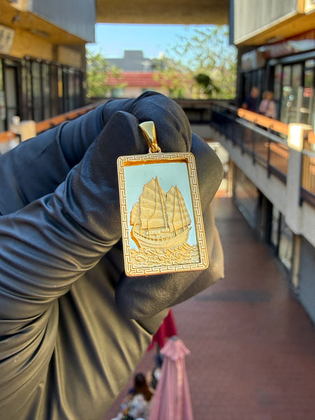 Original photograph of the 18K sailing ship pendant