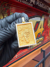 Original photograph of the 18K tiger and bamboo diamond pendant