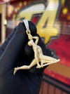 Original front photograph of the 18K warrior with sword pendant and diamond bail