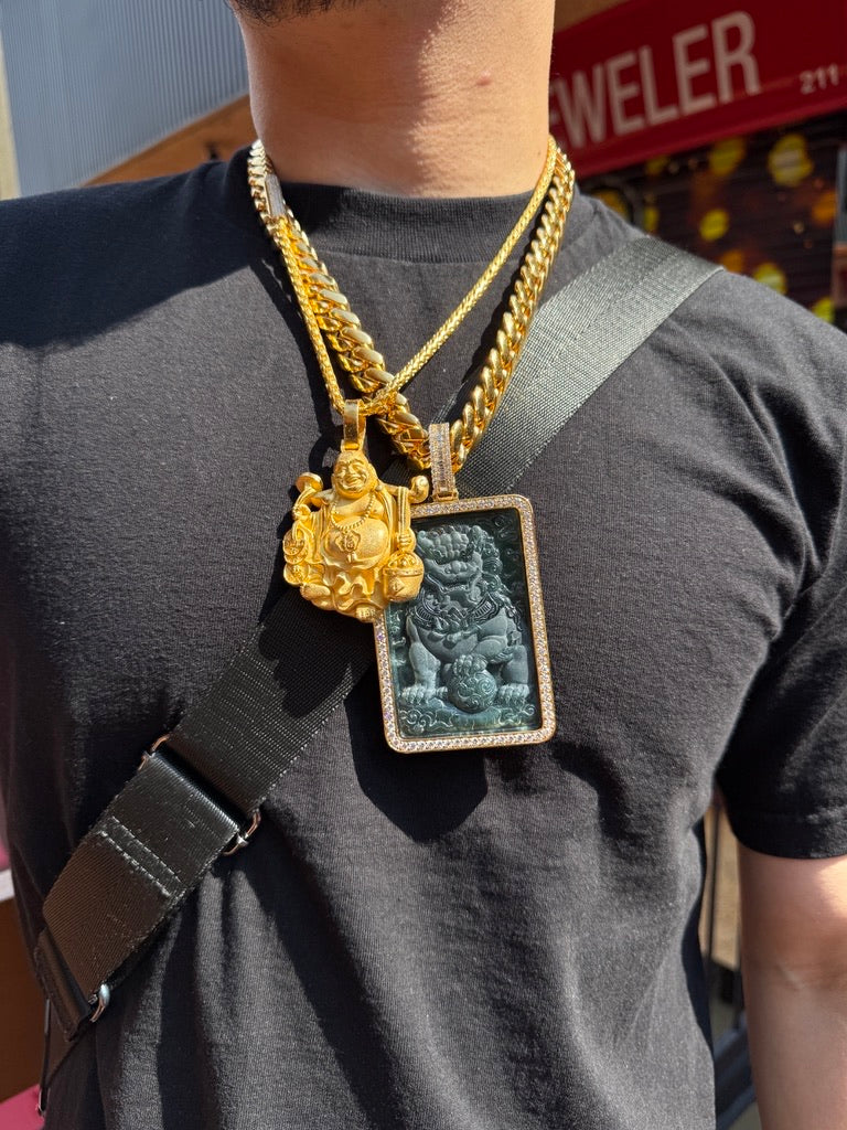 TA Jewelers gold pendants worn on gold chains